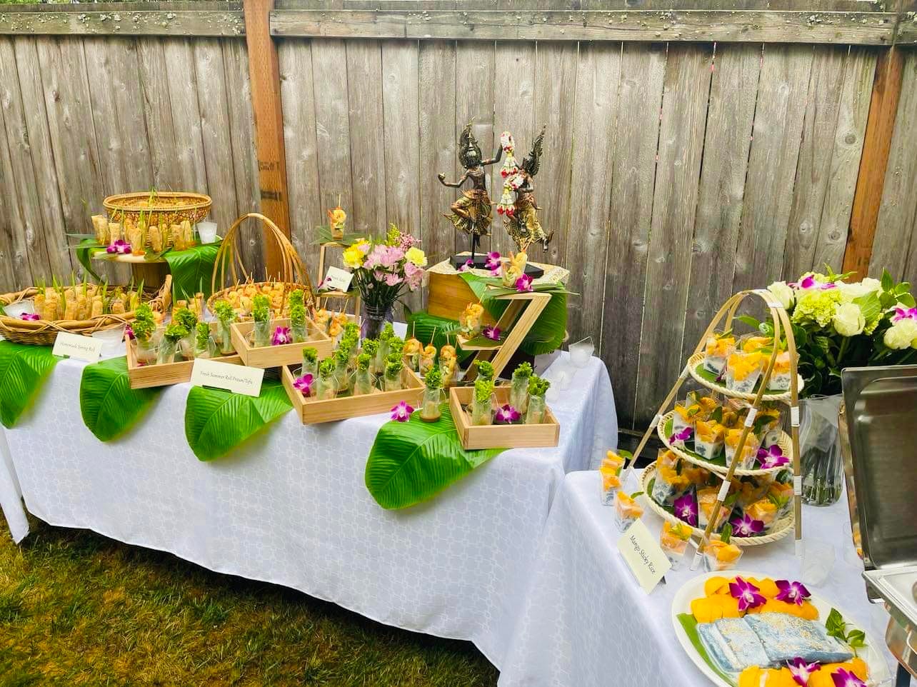Thai catering food tray with colorful dishes